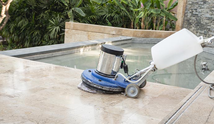 Professional limestone floor cleaning in progress