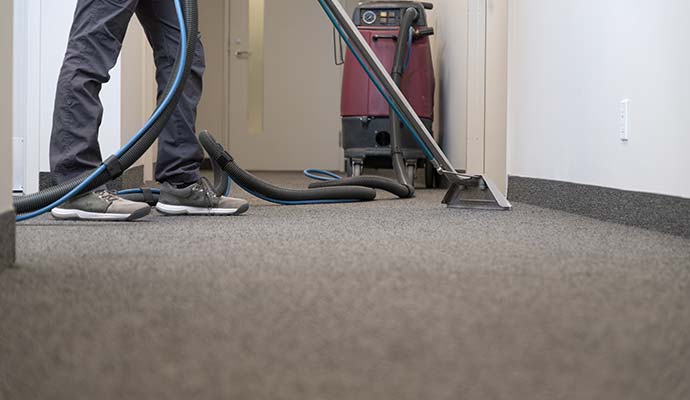 Residential carpet cleaning using hot water extraction method