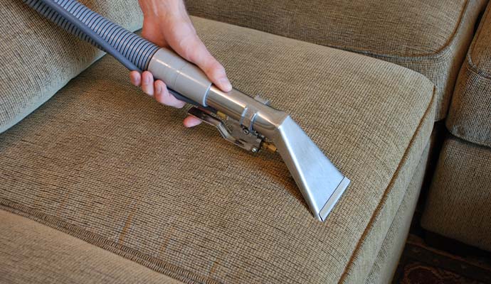 Cleaner cleaning upholstery