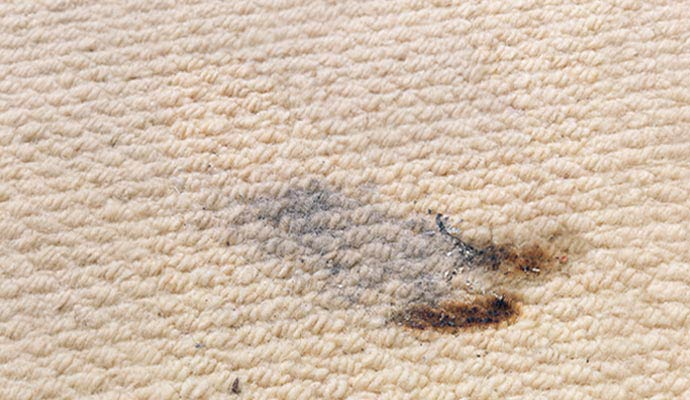 Cigarette stain on carpet