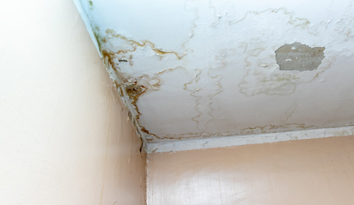 Water damaged ceiling due to roof leak