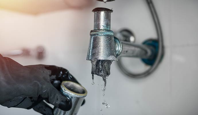 Clearing a severely clogged drain pipe under a sink