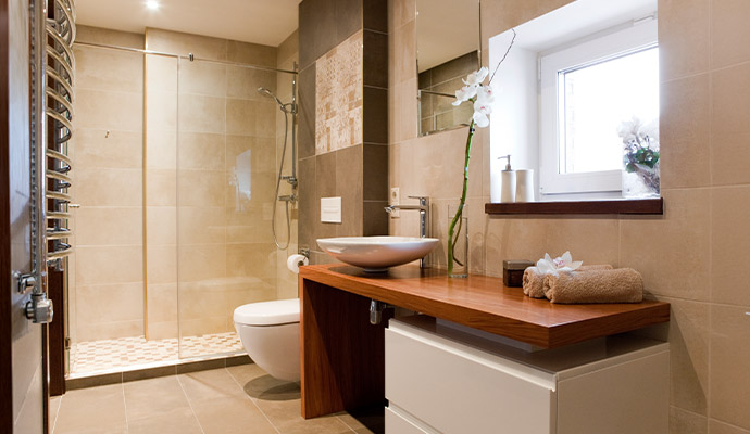 Modern residential bathroom with a walk-in shower and stylish vanity
