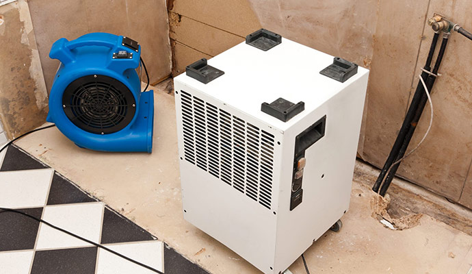 Professional water damage drying equipment set up for structural drying